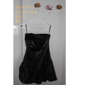 Black “(p)leather” strapless dress